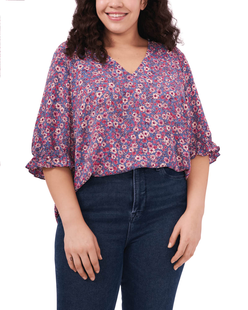 Front of a model wearing a size 1X Charlotte V-Neck Blouse in BRISK BLUE by CeCe. | dia_product_style_image_id:263363